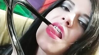 Morticia sucks on heel