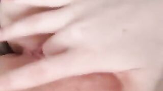 Naked beauty with perfect breasts masturbates. Close-up.