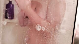 Busty Teen Presses Soapy Tits and Big Ass Against the Foggy Shower Glass