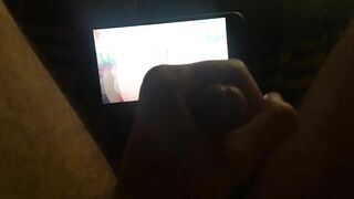 Горячий парень смотрит хентай и мастурбирует член