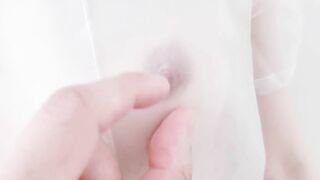 A fashion model wearing a see-through sailor suit gets excited when a masseuse touches her nipples