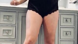 Blonde milf rubbing titties and fucking herself