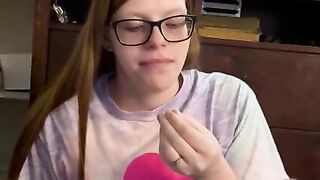 Redhead gets comfortable then takes a load