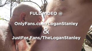 Daddy bear and ginger cub having some oral fun on the beach