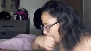 Freaky bitch in glasses sucking dick