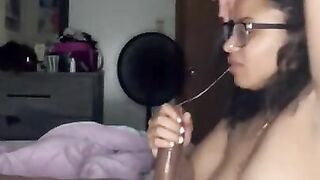 Freaky bitch in glasses sucking dick