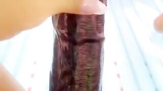 Fucking my huge bbc dildo & squirting in public tanning bed