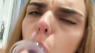 An excited libertine sucks a rubber dick up to the tonsils.