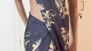 Amateur Indian Desi girl does saree strip tease for her boyfriend during a wedding