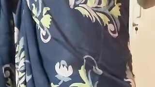 Amateur Indian Desi girl does saree strip tease for her boyfriend during a wedding