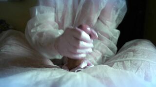 woman in a gas mask and gloves jerks off a cock and sucks. Handjob, blowjob