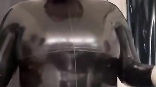 Latex catsuit and gloves