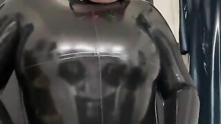 Latex catsuit and gloves