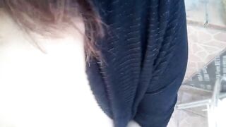 The milf neighbor on her terrace wearing latex clothes