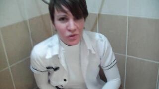 Pissing show in a shower in a hotel room