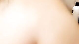 Inked girl riding dildo in the shower