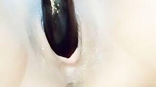 Asian hottie fucks eggplant and squirts