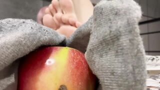 Dominates with socks during watching a film