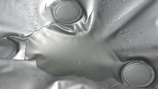 Pissing on an air mattress by a milf with a hairy pussy and big natural tits.