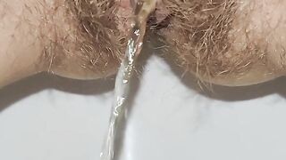 Powerful stream of piss from my hairy pussy | Up Close POV | Free Pee Porn Videos