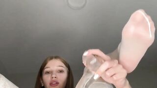 Blonde with an amazing body sucks a huge dildo and then jerks off her wet pussy with it