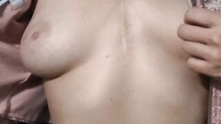 Tummy play in pink zipup shirt