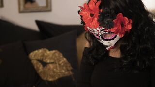 Masked woman using her magic wand