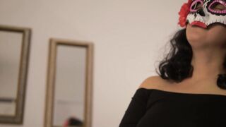 Masked woman using her magic wand